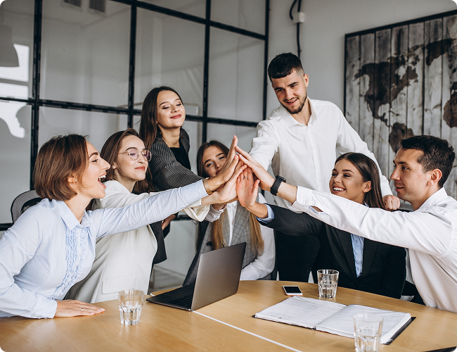 Team hands stacked in unity